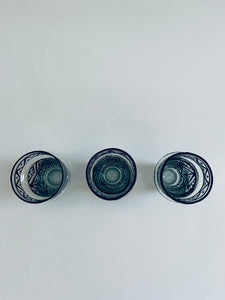 A set of three Moroccan tea cups